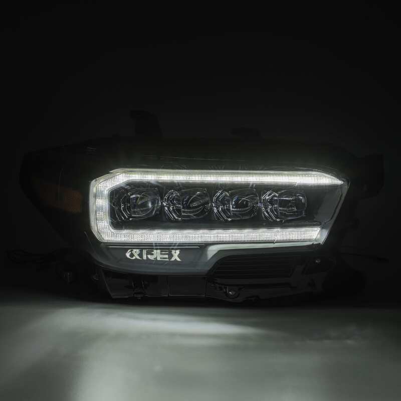 AlphaRex 16-20 Toyota Tacoma NOVA LED Projector Headlight Plank Style Alpha Black w/Activation Light - B2B Diesel & Gas Service