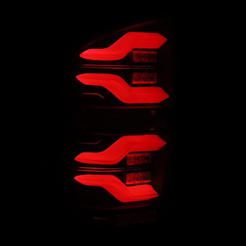 AlphaRex 16-21 Toyota Tacoma LUXX LED Taillights Alpha Blk w/Activ Light/Seq Signal - B2B Diesel & Gas Service