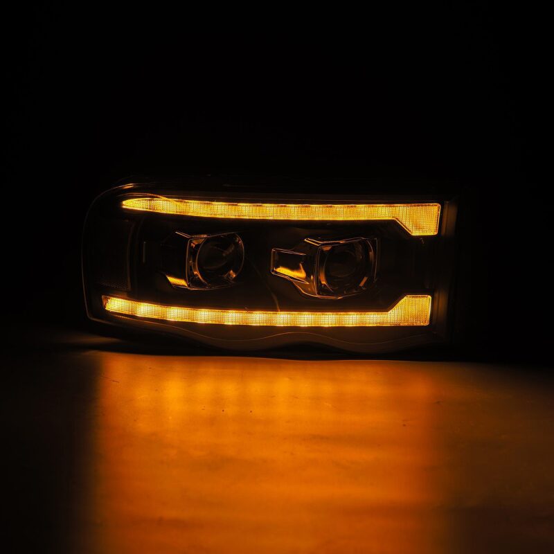 AlphaRex 02-05 Dodge Ram 1500 LUXX LED Proj Headlights Plank Style Black w/Activ Light/Seq Signal - B2B Diesel & Gas Service