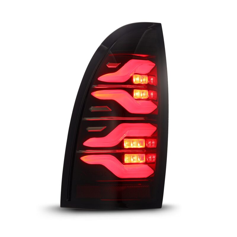 AlphaRex 05-15 Toyota Tacoma LUXX LED Taillights Blk/Red w/Activ Light/Seq Signal - B2B Diesel & Gas Service