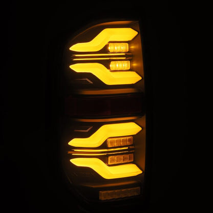 AlphaRex 14-21 Toyota Tundra LUXX LED Taillights Alpha Blk w/Activ Light/Seq Signal - B2B Diesel & Gas Service