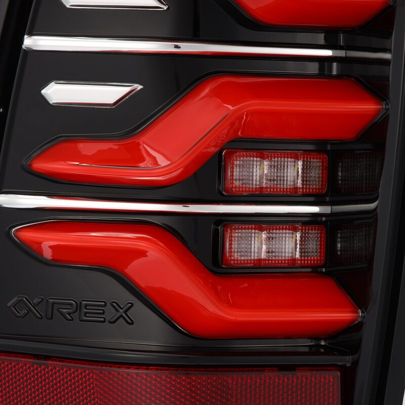 AlphaRex 05-15 Toyota Tacoma LUXX LED Taillights Blk/Red w/Activ Light/Seq Signal - B2B Diesel & Gas Service