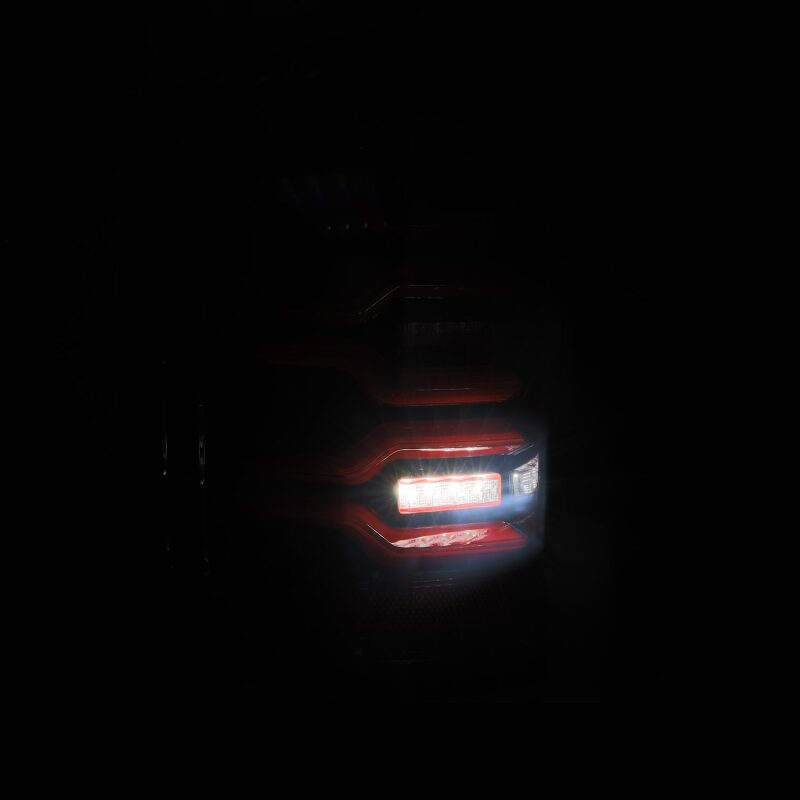 AlphaRex 14-18 Chevy Silverado 1500 Luxx-Series LED Tail Lights Black/Red w/Activ Light/Seq Signal - B2B Diesel & Gas Service