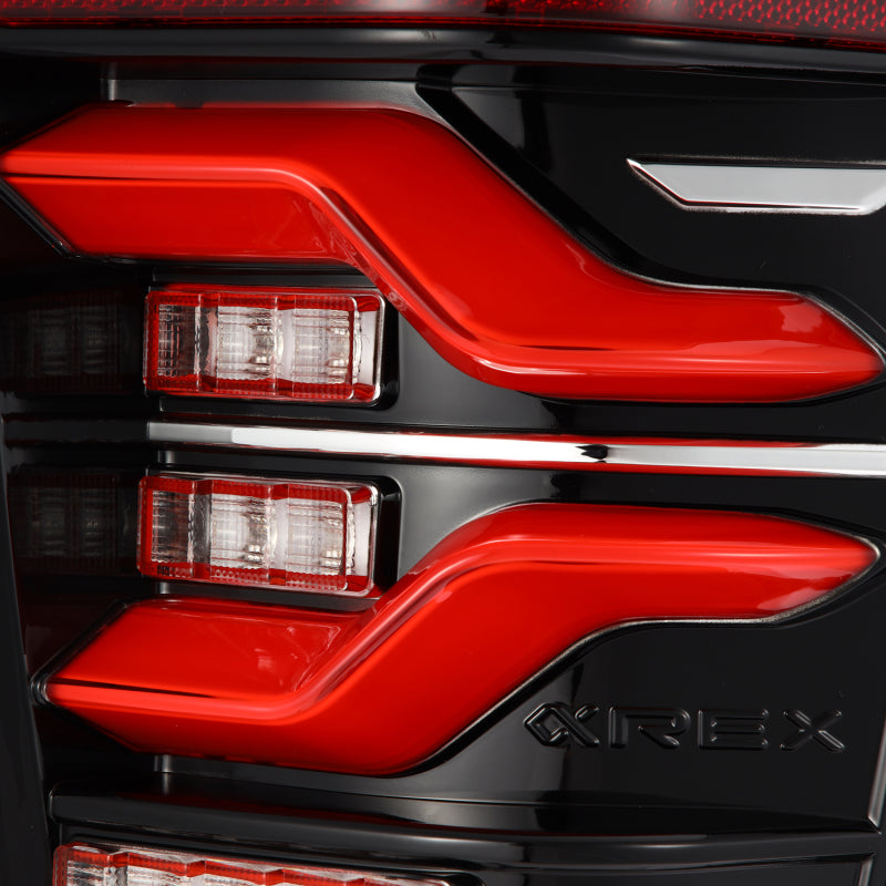AlphaRex 16-21 Toyota Tacoma LUXX LED Taillights Blk/Red w/Activ Light/Seq Signal - B2B Diesel & Gas Service