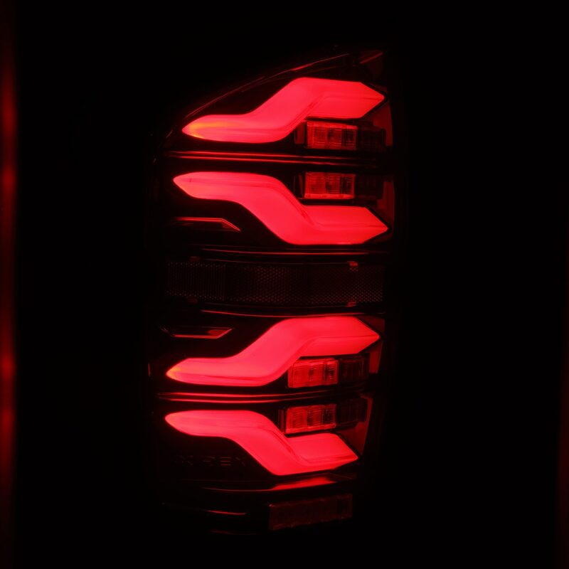 AlphaRex 16-21 Toyota Tacoma LUXX LED Taillights Blk/Red w/Activ Light/Seq Signal - B2B Diesel & Gas Service