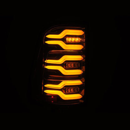 AlphaRex 19-21 Dodge Ram 1500 Luxx-Series LED Tail Lights Alpha-Black w/Activ Light/Seq Signal - B2B Diesel & Gas Service