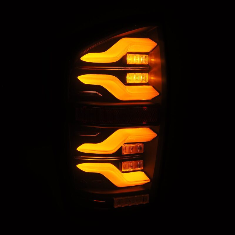AlphaRex 16-21 Toyota Tacoma LUXX LED Taillights Blk w/Activ Light/Seq Signal - B2B Diesel & Gas Service