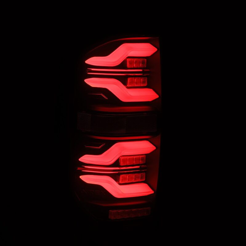 AlphaRex 14-21 Toyota Tundra LUXX LED Taillights Alpha Blk w/Activ Light/Seq Signal - B2B Diesel & Gas Service
