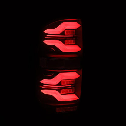 AlphaRex 14-21 Toyota Tundra LUXX LED Taillights Alpha Blk w/Activ Light/Seq Signal - B2B Diesel & Gas Service