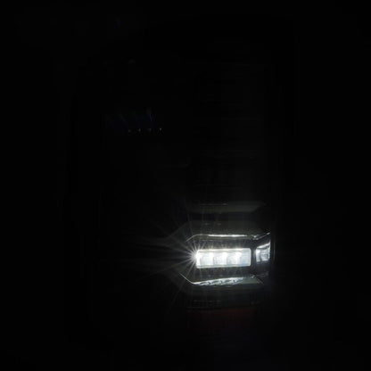 AlphaRex 14-18 GMC Sierra 1500/2500HD/3500HD LUXX-Series LED Tail Lights Alpha-Blk Actv Lgt Seq. Sig - B2B Diesel & Gas Service