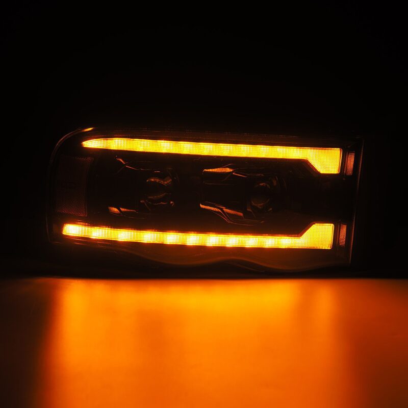 AlphaRex 02-05 Dodge Ram 1500 LUXX LED Proj Headlights Alpha Black w/Activ Light/Seq Signal - B2B Diesel & Gas Service