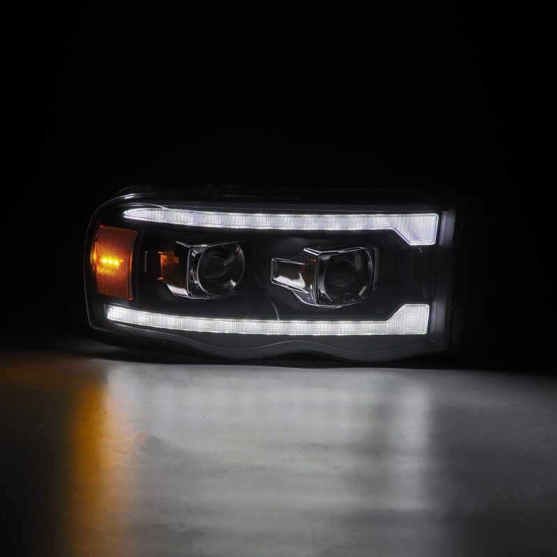 AlphaRex 02-05 Dodge Ram 1500 LUXX LED Proj Headlights Plank Style Black w/Activ Light/Seq Signal - B2B Diesel & Gas Service