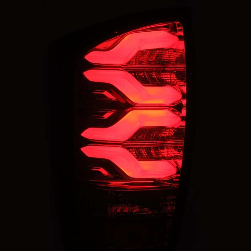 AlphaRex 16-21 Toyota Tacoma LUXX LED Taillights Blk/Red w/Activ Light/Seq Signal - B2B Diesel & Gas Service