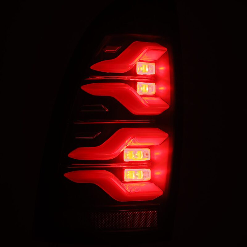 AlphaRex 05-15 Toyota Tacoma LUXX LED Taillights Blk w/Activ Light/Seq Signal - B2B Diesel & Gas Service