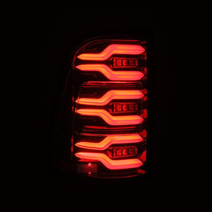 AlphaRex 19-21 Dodge Ram 1500 Luxx-Series LED Tail Lights Alpha-Black w/Activ Light/Seq Signal - B2B Diesel & Gas Service
