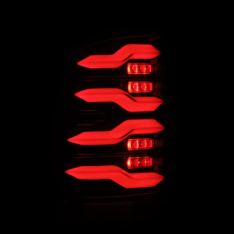 AlphaRex 09-18 Dodge Ram Luxx-Series LED Tail Lights Alpha-Black w/ Activation Light & Seq. Signal - B2B Diesel & Gas Service