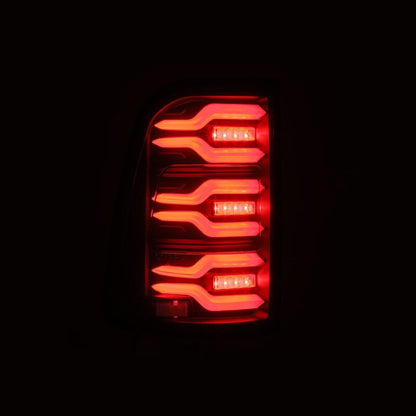 AlphaRex 19-21 Dodge Ram 1500 Luxx-Series LED Tail Lights Black w/Activ Light/Seq Signal - B2B Diesel & Gas Service