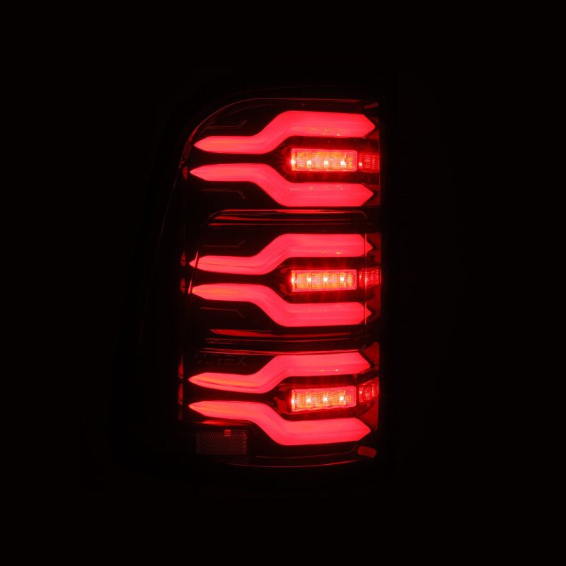 AlphaRex 19-21 Dodge Ram 1500 Luxx-Series LED Tail Lights Black/Red w/Activ Light/Seq Signal - B2B Diesel & Gas Service