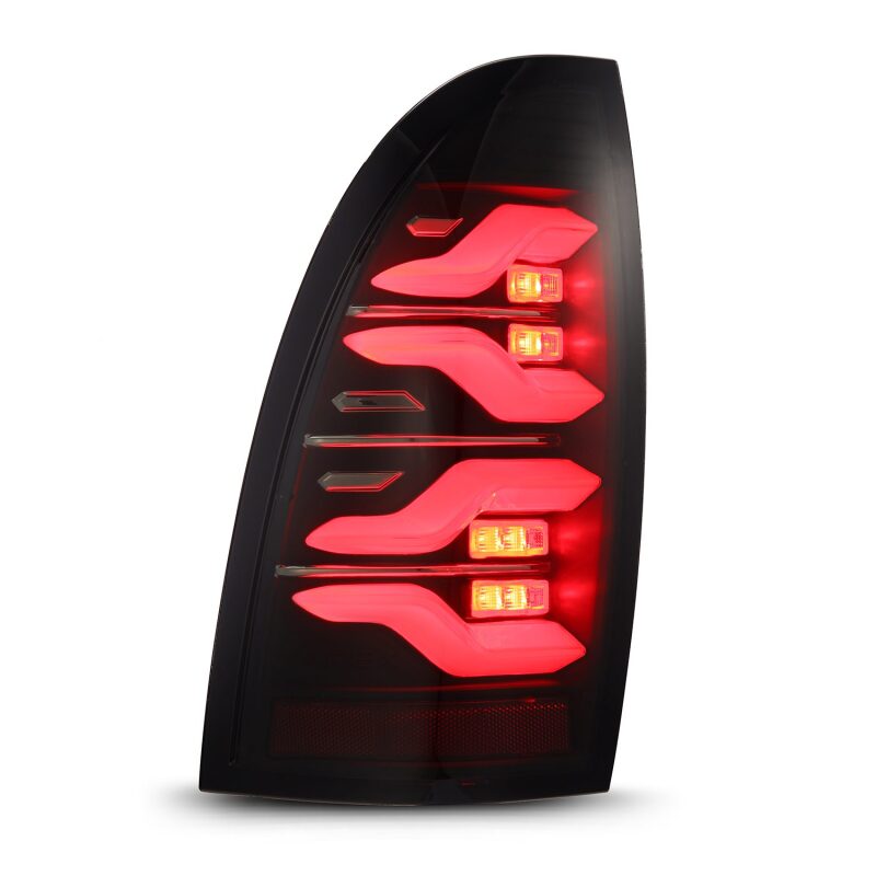 AlphaRex 05-15 Toyota Tacoma LUXX LED Taillights Blk w/Activ Light/Seq Signal - B2B Diesel & Gas Service