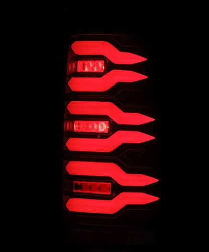 AlphaRex 99-06 Chevrolet Silverado/99-06 GMC Sierra LUXX-Series LED Tail Lights - Black/Red - B2B Diesel & Gas Service