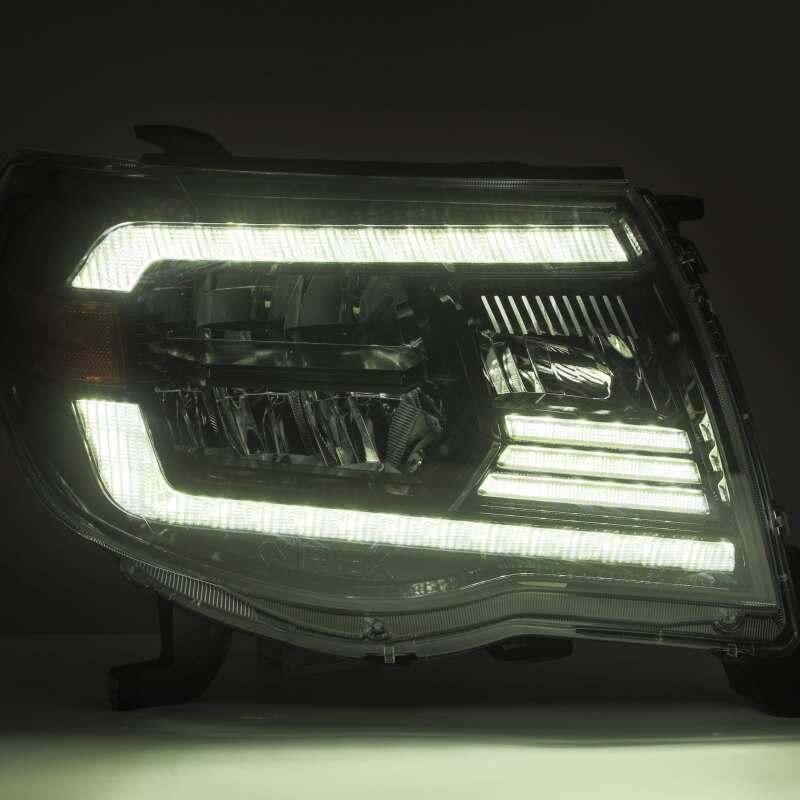 AlphaRex 05-11 Toyota Tacoma LUXX Crystal Headlights Plank Style Alpha Black w/Activation Light/DRL - B2B Diesel & Gas Service
