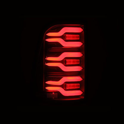 AlphaRex 19-21 Dodge Ram 1500 Luxx-Series LED Tail Lights Black w/Activ Light/Seq Signal - B2B Diesel & Gas Service