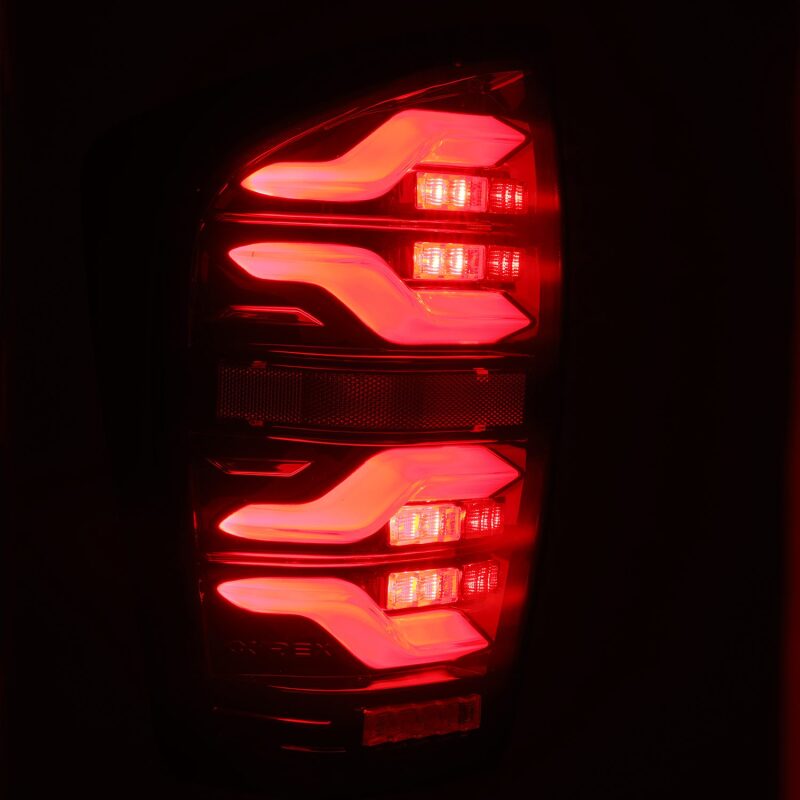 AlphaRex 16-21 Toyota Tacoma LUXX LED Taillights Blk/Red w/Activ Light/Seq Signal - B2B Diesel & Gas Service