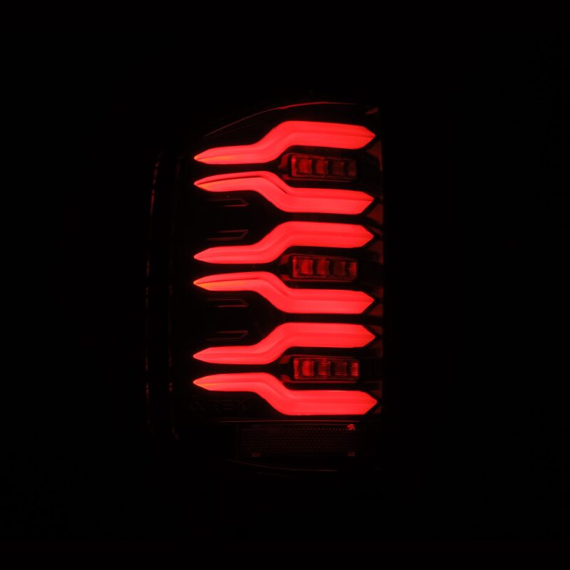 AlphaRex 14-18 Chevy Silverado 1500 Luxx-Series LED Tail Lights Alpha-Black w/Activ Light/Seq Signal - B2B Diesel & Gas Service
