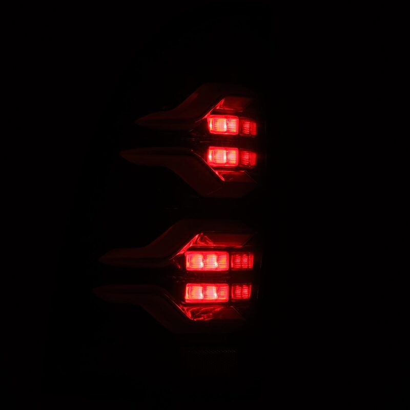 AlphaRex 05-15 Toyota Tacoma LUXX LED Taillights Alpha Blk w/Activ Light/Seq Signal - B2B Diesel & Gas Service