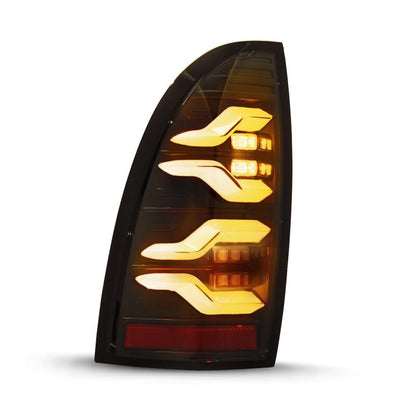 AlphaRex 05-15 Toyota Tacoma LUXX LED Taillights Blk w/Activ Light/Seq Signal - B2B Diesel & Gas Service