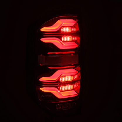 AlphaRex 14-21 Toyota Tundra LUXX LED Taillights Blk w/Activ Light/Seq Signal - B2B Diesel & Gas Service